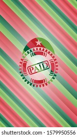 paid icon inside christmas badge.
