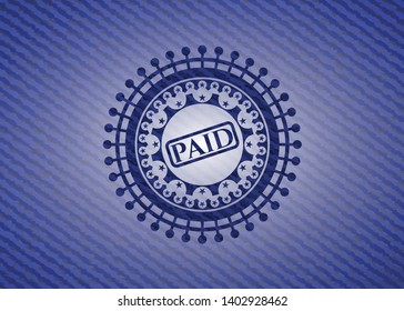 paid icon inside denim background