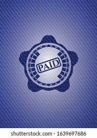 paid icon inside emblem with denim high quality background