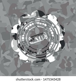 paid icon inside grey camouflage texture