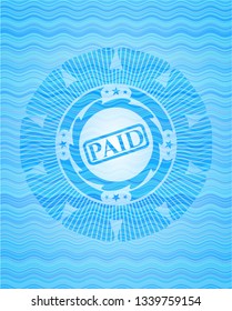 paid icon inside light blue water badge background.