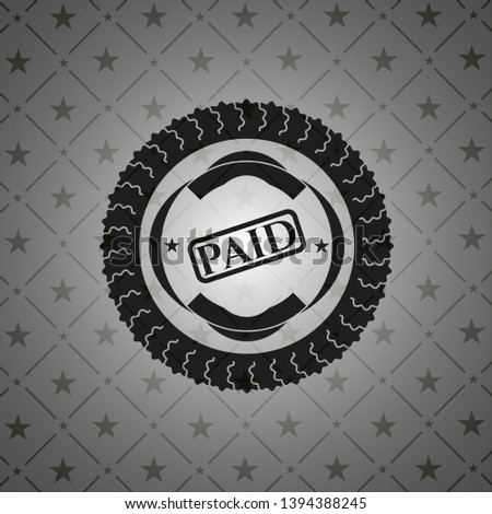 paid icon inside realistic black emblem