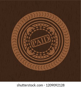 paid icon inside retro style wooden emblem