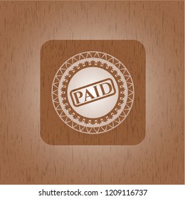 paid icon inside retro style wooden emblem
