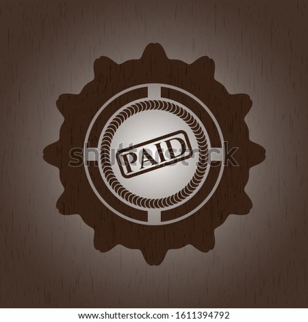 paid icon inside wood emblem. Vintage.