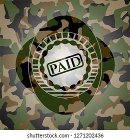 paid icon on camouflage pattern