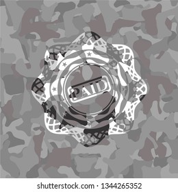 paid icon on grey camo texture
