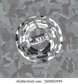 paid icon on grey camo texture
