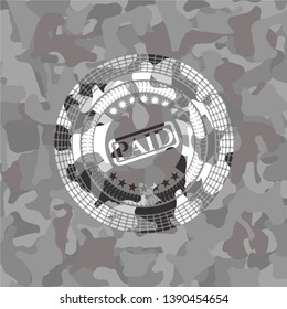 paid icon on grey camouflage pattern