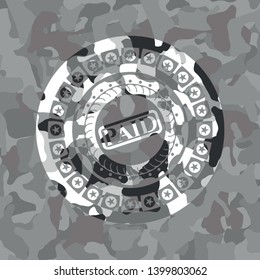 paid icon on grey camouflaged texture