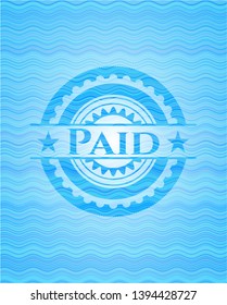 Paid light blue water wave style emblem. Vector Illustration. Detailed.