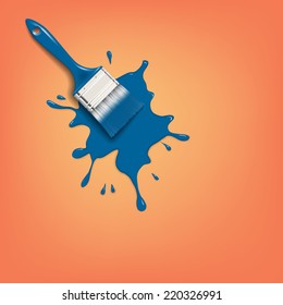 paint brush with blue paint splash on the orange wall