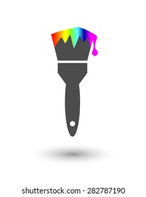 Paint brush with colourful paint drop