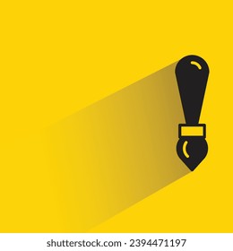 paint brush icon with shadow on yellow background