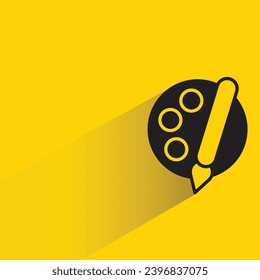 paint brush icon with shadow on yellow background