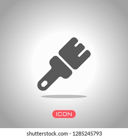 Paint brush, simple icon. Icon under spotlight. Gray background