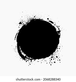 Paint brush stain with ink splashes. Grunge circle shape for frame, banner, text box, clipping masks or other art projects. Vector design element isolated on white background.