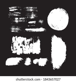 Paint brush stains, strokes, splatters and blots of different shapes for frame, banner, label, text box, clipping masks or other art design. Vector grunge textures isolated on black backgrounds. 
