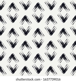 Paint brush stroke seamless pattern. Hand drawn repeated diamond motif. Modern artistic geometric surface print. Freehand design texture. Doodle grunge style ornament. Vector abstract background