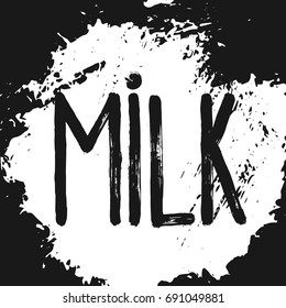 Paint brush strokes texture of Milk inscription on white art stain background