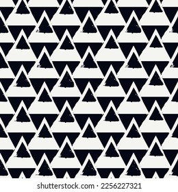 Paint brush triangles ornament. Seamless pattern. Hand drawn geometrical backdrop. Triangular shapes wallpaper. Geometric background. Ethnic motif. Tribal digital paper. Textile print. Vector art.