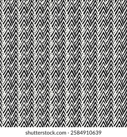Paint brush zigzag lines. Hand drawn seamless pattern. Jagged stripes motif. Wavy linear ornament. Chevrons image. Striped backdrop. Geometric digital paper. Ethnic textile print. Tribal design