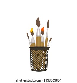 paint brushes in a jar
