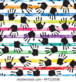 Paint Hand prints vector background. Colorful Seamless pattern with handprints on striped grunge brush strokes background