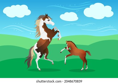 Paint horse mare with adorable foal on pasturage in summer.