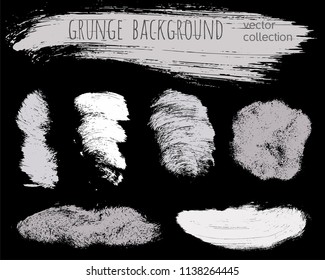 Paint lines grunge collection. Set of silver grungy hand drawn brush strokes isolated on black. Abstract ink texture, design elements, borders or frames. Brush strokes set backgrounds.