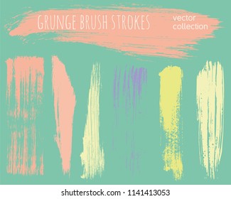 Paint lines grunge collection. Set of colorful pastel grungy hand drawn brush strokes on a green backdrop. Abstract ink texture, design elements, borders or frames. Brush strokes set backgrounds.