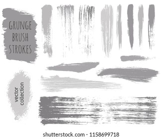 Paint lines grunge collection. Set of silver grungy hand drawn brush strokes isolated on white. Abstract ink texture, design elements, borders or frames. Brush strokes set backgrounds.