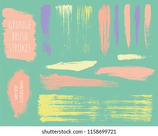 Paint lines grunge collection. Set of colorful pastel grungy hand drawn brush strokes on a green backdrop. Abstract ink texture, design elements, borders or frames. Brush strokes set backgrounds.
