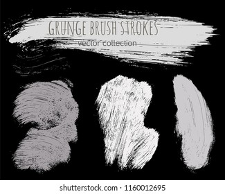 Paint lines grunge collection. Set of silver grungy hand drawn brush strokes isolated on black. Abstract ink texture, design elements, borders or frames. Brush strokes set backgrounds.