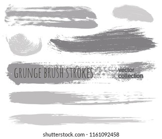 Paint lines grunge collection. Set of silver grungy hand drawn brush strokes isolated on white. Abstract ink texture, design elements, borders or frames. Brush strokes set backgrounds.