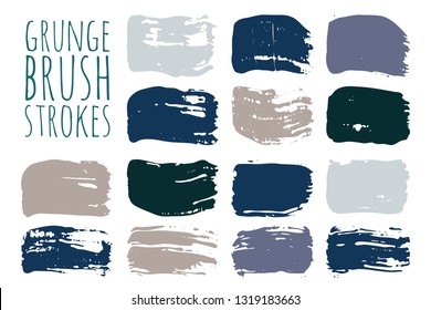 Paint lines grunge collection. Set of blue and grey grungy hand drawn brush strokes isolated on white. Abstract ink texture, design elements, borders or frames.  