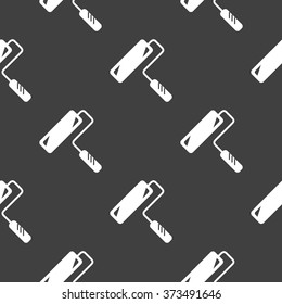 Paint roller icon sign. Seamless pattern on a gray background. 