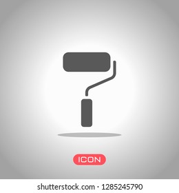 Paint roller, paintbrush icon. Icon under spotlight. Gray background