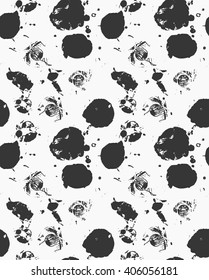 Paint rough stains on white.Hand drawn with ink seamless background.Monochrome paint stains and brush strokes creating artistic design backdrop.