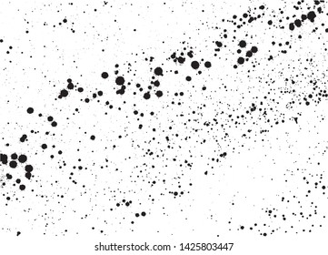 Paint splatter black over white. Ink blots grunge texture and background. Spray graffiti pattern.