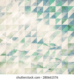 Painted abstract geometric background from watercolor triangle on grunge paper texture