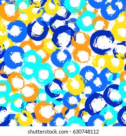 Painted blue background. Yellow orange circles. Hand drawn seamless pattern. Abstract decoration for wallpaper, textile print, fashionable fabric. Brush strokes vector illustration. Grunge design.