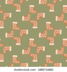 Painted boots seamless style winter pattern. Cozy shoes ornament print in green and red pale tones. Stock illustration. Vector design for textile, fabric, giftwrap, wallpapers.