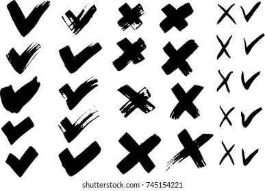 Painted brush check mark and cross signs set. Isolated, vector.