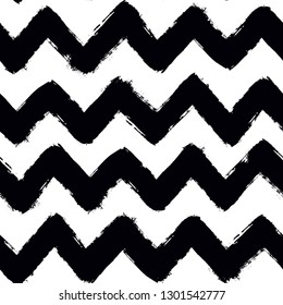 Painted chevron pattern. Seamless brush stroke lines. Sketchy hand drawn graphic print. Black and White background. Grungy decoration. Vector design. Wallpaper, furniture fabric, textile.