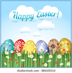 Painted Easter Eggs with different spring patterns in green grass under blue sky with clouds, caption "Happy Easter!"