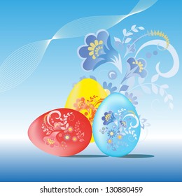 Painted easter eggs on a blue background.