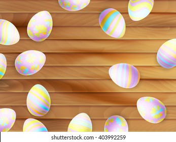 Painted Easter eggs on wooden background. top view. EPS 10 vector file included