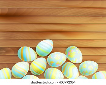 Painted Easter eggs on wooden background. top view. EPS 10 vector file included