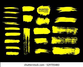 Painted grunge stripes set. Yellow  labels, background, paint texture. Brush strokes vector. Handmade design elements.